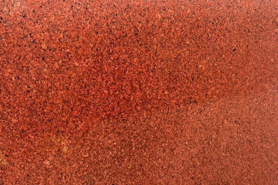 Jhansi Red granite slab, polished